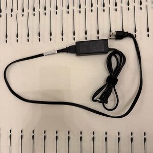 Genuine HP 45W AC laptop power adapter, compatible with various HP models.